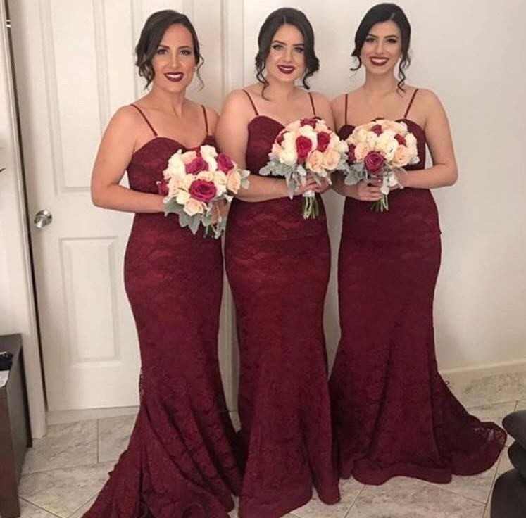 blush wedding dress with burgundy bridesmaids